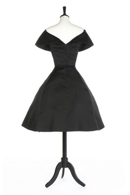 Lot 110 - A Christian Dior couture black satin cocktail...