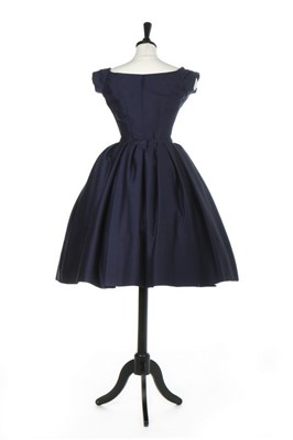 Lot 136 - A Christian Dior couture navy challis dinner...
