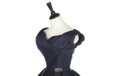 Lot 136 - A Christian Dior couture navy challis dinner...