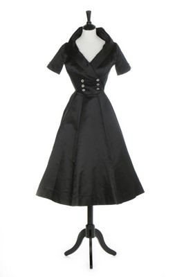 Lot 132 - Lauren Bacall's black satin dinner dress worn...