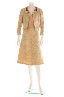 Lot 131 - A Chanel couture brocaded satin cocktail suit,...
