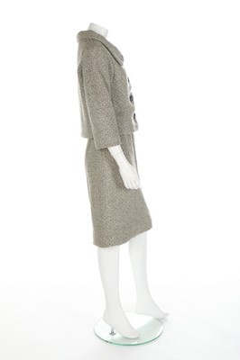 Lot 117 - A Balenciaga couture grey tweed suit, 1959,...