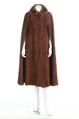 Lot 75 - A Gucci brown suede cape, circa 1970, labelled...