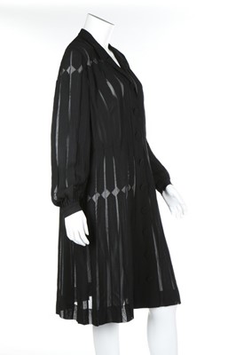 Lot 111 - A Paquin couture appliqued black chiffon...