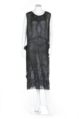 Lot 112 - A beaded black chiffon tabard dress, circa...