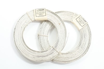 Lot 128 - Two un-used coils of baleen corsetry struts,...