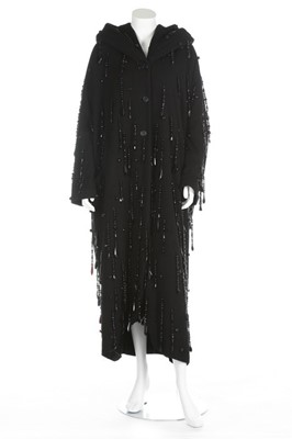 Lot 133 - A Dolce & Gabbana oversized black wool evening...