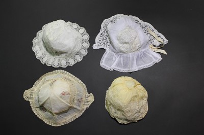 Lot 319 - A collection of women's caps, 1800-1920,...