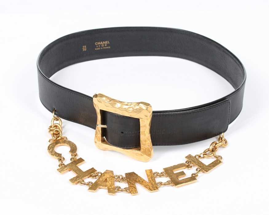 Lot 207 - A Chanel black leather belt, 1980s, the strap...