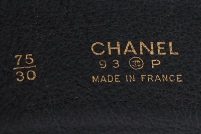 Lot 207 - A Chanel black leather belt, 1980s, the strap...