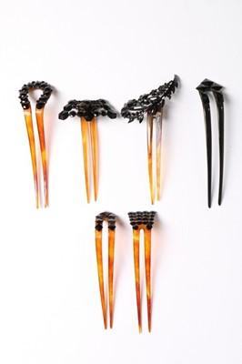 Lot 214 - A collection of jet glass beaded hair combs,...