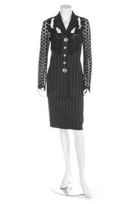 Lot 3 - A Gianni Versace dark grey pin-striped suit...