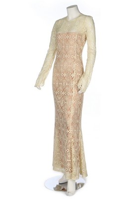 Lot 355 - A Biba ivory lace fishtail gown, early 1970s,...