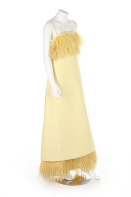 Lot 10 - A yellow gazar evening dress, circa 1967,...