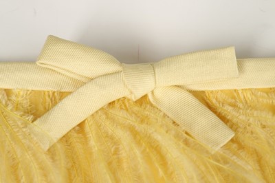 Lot 10 - A yellow gazar evening dress, circa 1967,...