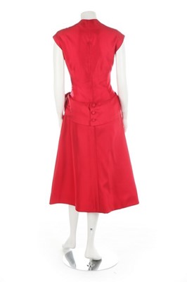 Lot 12 - A red silk couture dress, circa 1955, with...
