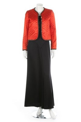 Lot 22 - An Yves Saint Laurent quilted coral satin...