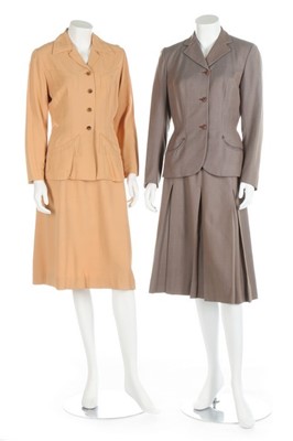 Lot 37 - Five day suits, a dress and jacket, 1940s-50s,...