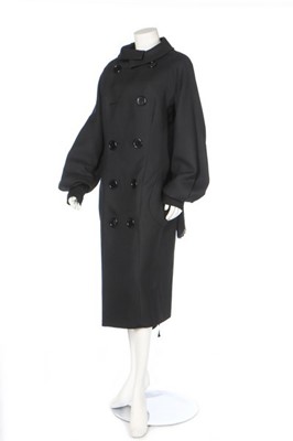 Lot 299 - A Yohji Yamamoto black wool coat, late 1980s,...