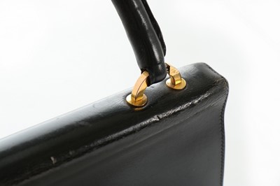 Lot 71 - An Hermès black box calf 'Ring' handbag, 1960s,...