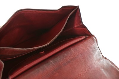 Lot 72 - An Hermès ox blood leather 'Tourniquet' bag,...