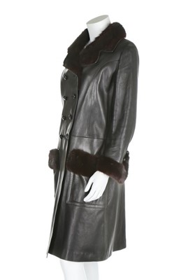 Lot 128 - An Yves Saint Laurent couture black leather...