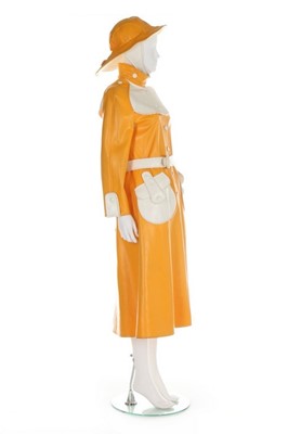 Lot 132 - A Courrèges yellow and white vinyl sou'wester...