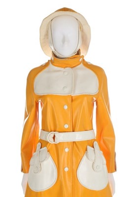 Lot 132 - A Courrèges yellow and white vinyl sou'wester...
