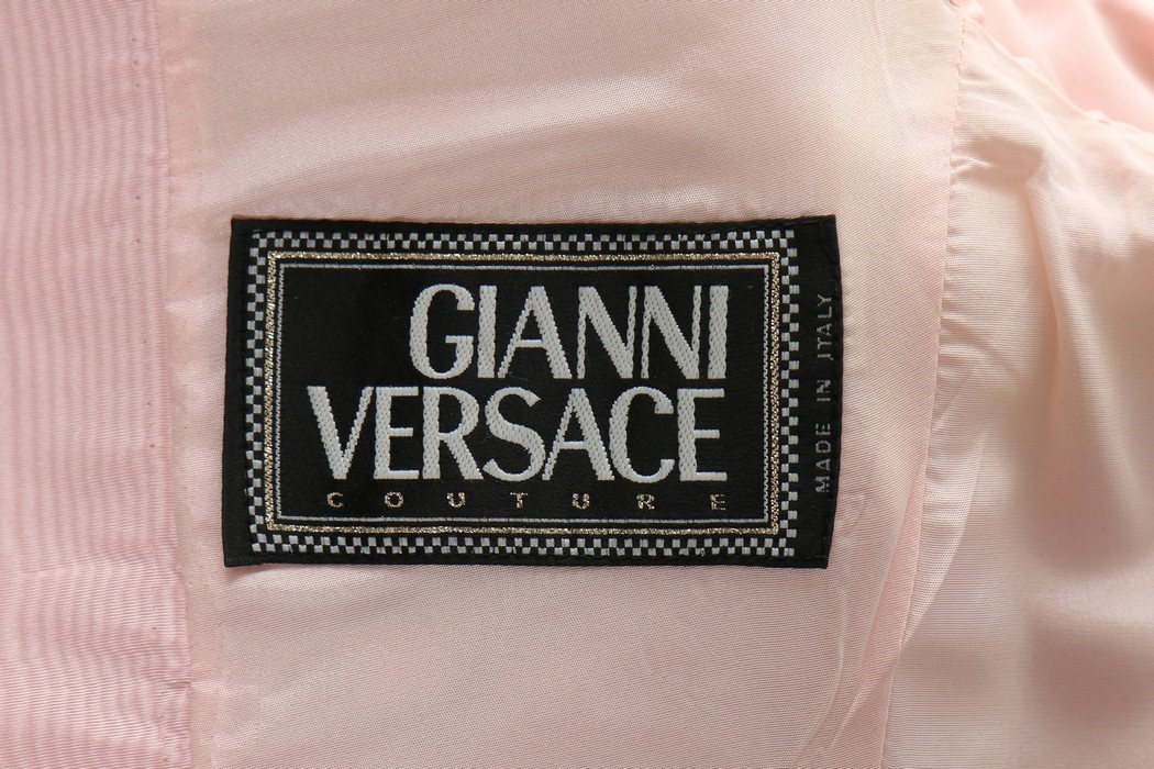 Lot 230 - A Gianni Versace pink moiré evening jacket,