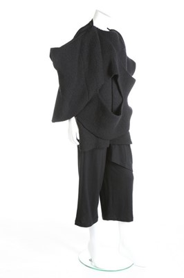 Lot 184 - A Comme des Garçons black knitted top,...