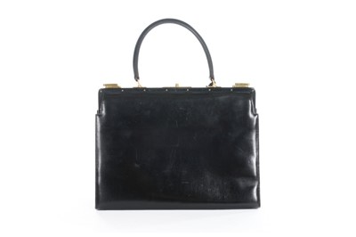Lot 8 - An Hermès black leather '404' handbag, 1960s,...