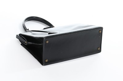 Lot 8 - An Hermès black leather '404' handbag, 1960s,...