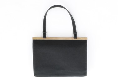 Lot 5 - A Cartier black silk ottoman evening bag with...