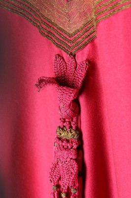 Lot 38 - A Maison Worth cyclamen pink wool evening coat,...