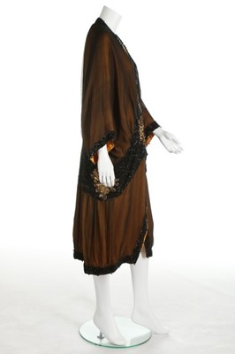 Lot 53 - A beaded opera coat, circa 1915-20, the...