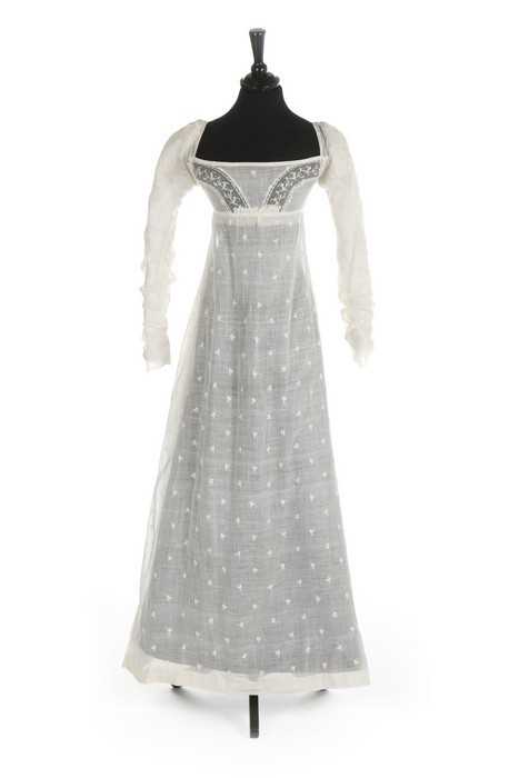 Lot 36 - A sprigged muslin dress, circa 1800, the...