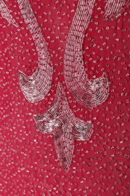 Lot 75 - A raspberry-pink muslin flapper dress, circa...