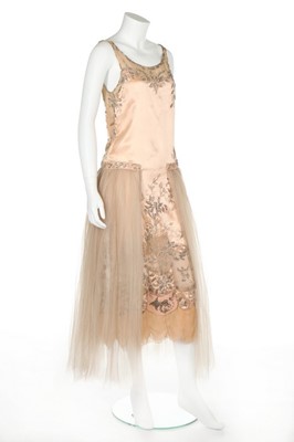 Lot 50 - A couture beaded satin gown, possibly Patou,...