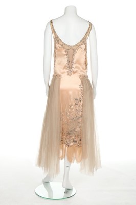 Lot 50 - A couture beaded satin gown, possibly Patou,...