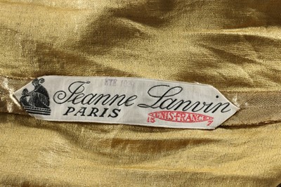 Lot 48 - A Jeanne Lanvin couture gold lam evening...