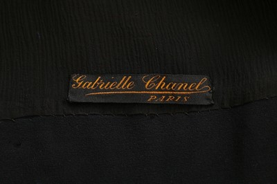 Lot 59 - A Gabrielle Chanel beaded silk crpe capelet,...
