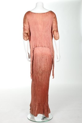 Lot 56 - A Mariano Fortuny rose pink silk Peplos dress,...