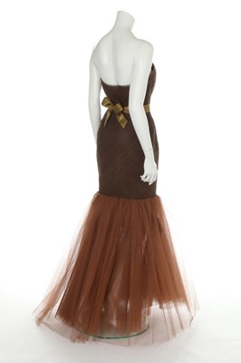 Lot 233 - An Yves Saint Laurent couture brown tulle...
