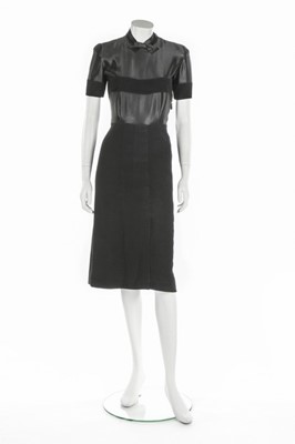 Lot 95 - A rare and early Balenciaga couture black wool...