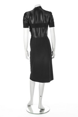 Lot 62 - A rare and early Balenciaga couture black wool...