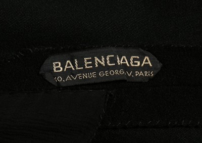 Lot 62 - A rare and early Balenciaga couture black wool...