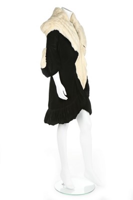 Lot 70 - A Paquin black velvet and white fur coat,...