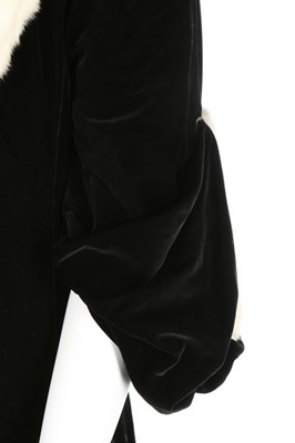 Lot 70 - A Paquin black velvet and white fur coat,...