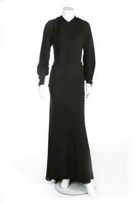 Lot 73 - A Lucien Lelong couture black silk crêpe...