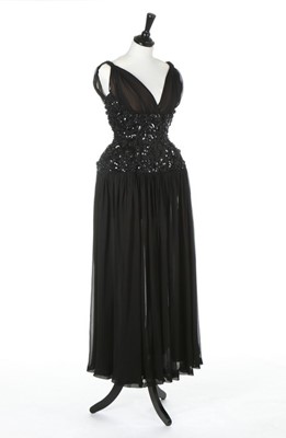 Lot 79 - A Balenciaga couture black crpe georgette...